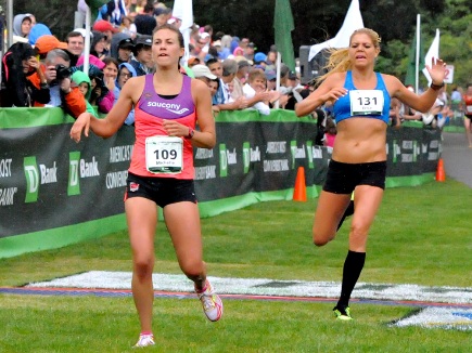 Erica Jesserman, right, and Michelle Lillenthal at finish line of 2013 race. This year, Lillenthal is a Maine Resident.