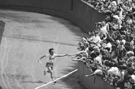 Dave McGillivray, recipient of The Sports Museum Lifetime Achievement Award, completing his 1978 historic run across the U.S. inside Fenway Park.