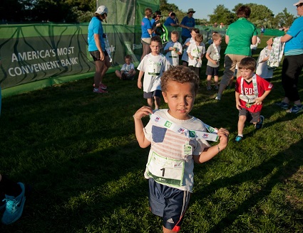 Kids of all age experience the joy of running each year at the Kids Fun Run on the Friday night before the race.