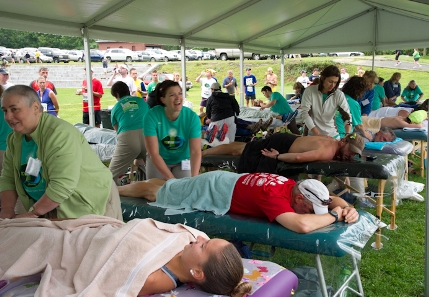 Runners receiving post-race massages at 2013 TD Beach to Beacon 10K Road Race in Cape Elizabeth, Maine.