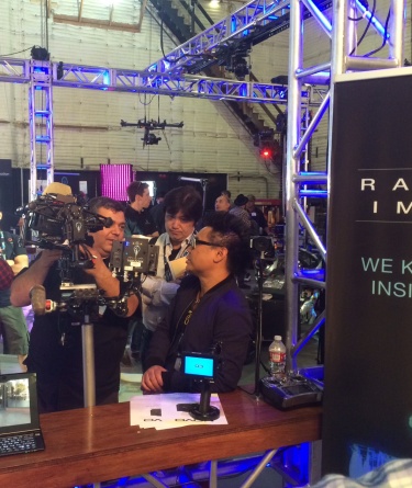 Michael Mansouri discusses filmmaking gear with Matthew Libatique, ASC, in Radiant Images booth at 2014 Cine Gear.