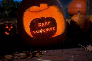 The 2012 Camp Sunshine Pumpkin Festival featured 7,658 lit jack-o-lanterns and raised $80,175 to help sick children and their families