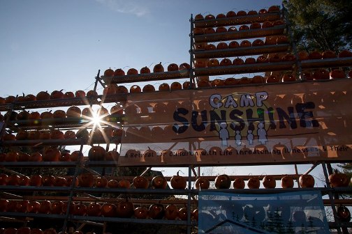 The 2012 Camp Sunshine Pumpkin Festival featured 7,658 lit jack-o-lanterns and raised $80,175 to help sick children and their families