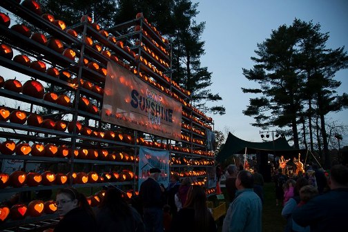 The 2012 Camp Sunshine Pumpkin Festival featured 7,658 lit jack-o-lanterns and raised $80,175 to help sick children and their families