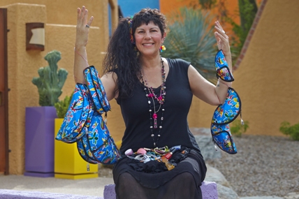 Tucson artist Sherrie Posternak creates colorful Mexican oilcloth aprons and unique taco bags for sale at www.cerezastudio.com.